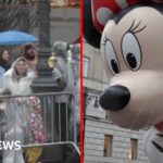 Macy’s 100th Thanksgiving parade marches on despite the rain in New York City