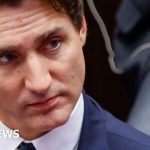 Faced with turmoil, a defiant Trudeau hangs on for now