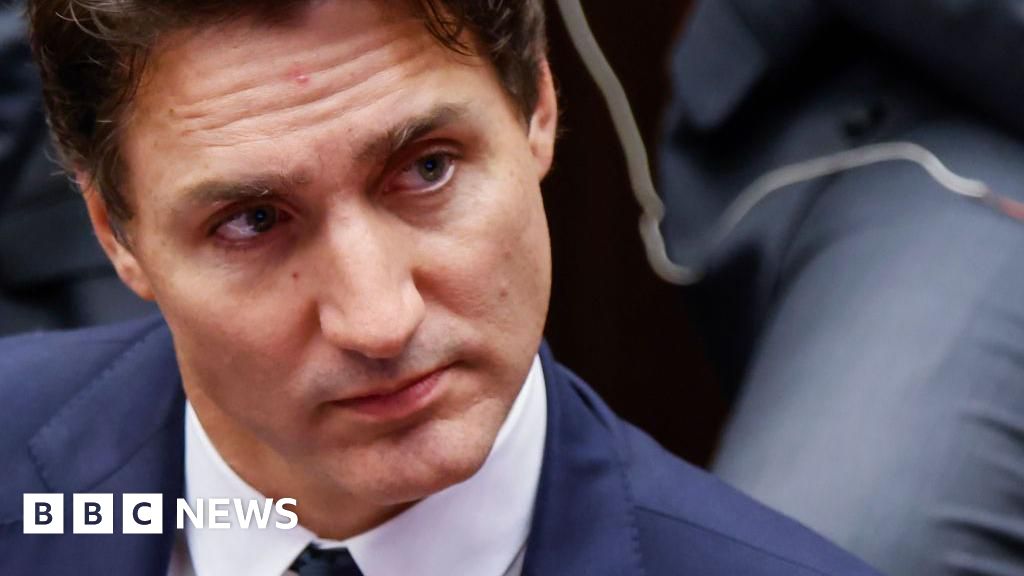 Faced with turmoil, a defiant Trudeau hangs on for now