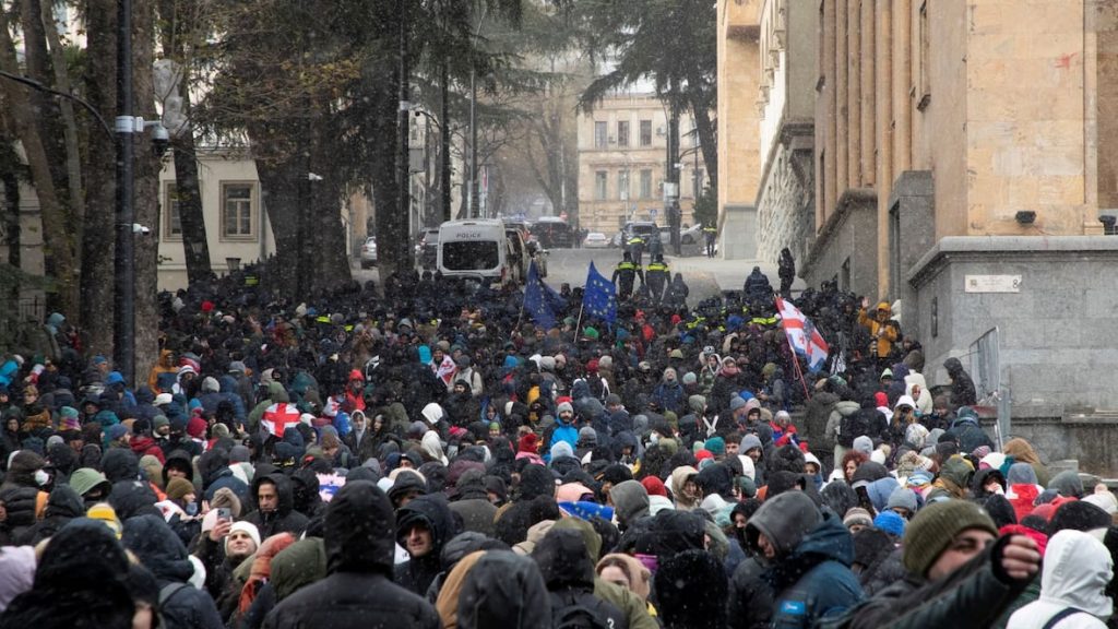 Protests in Georgia continue as ex-footballer becomes president