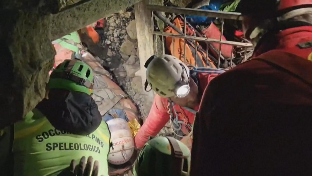 Rescue crews free injured explorer from underground cave — again