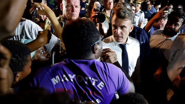 French President Macron in angry exchange with frustrated residents in cyclone-hit Mayotte