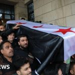 ‘I wish he’d lived to see new Syria’: Crowds bury anti-Assad activist