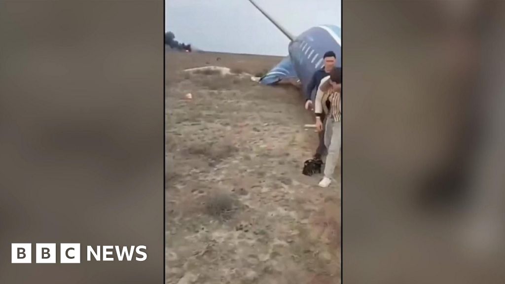 Footage shows survivors walking from crashed Azerbaijani plane