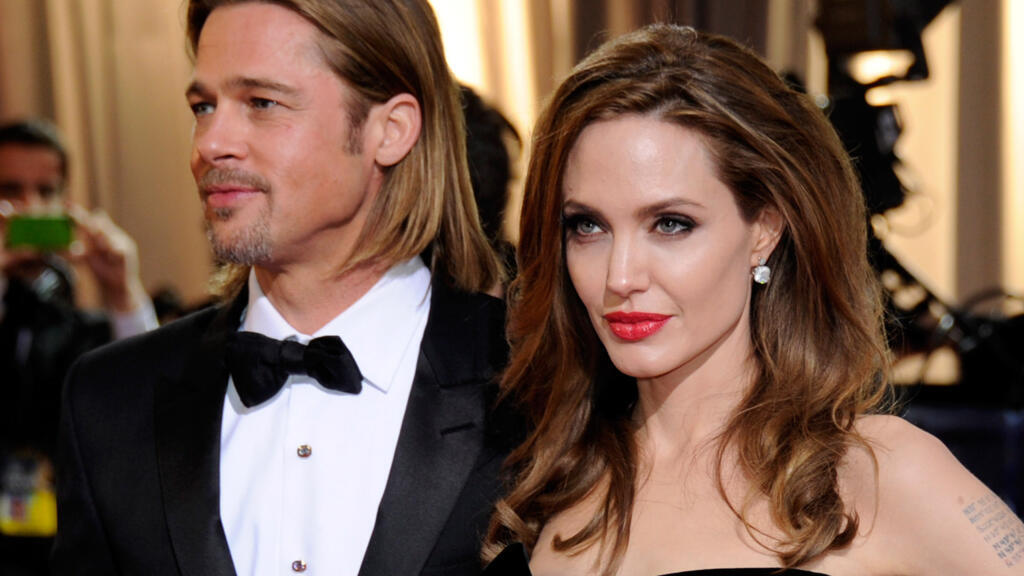 Brad Pitt and Angelina Jolie reach divorce settlement after 8-year court battle