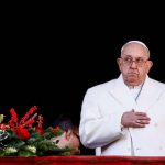 Pope urges the world to put down arms, ‘overcome divisions’ in Christmas message