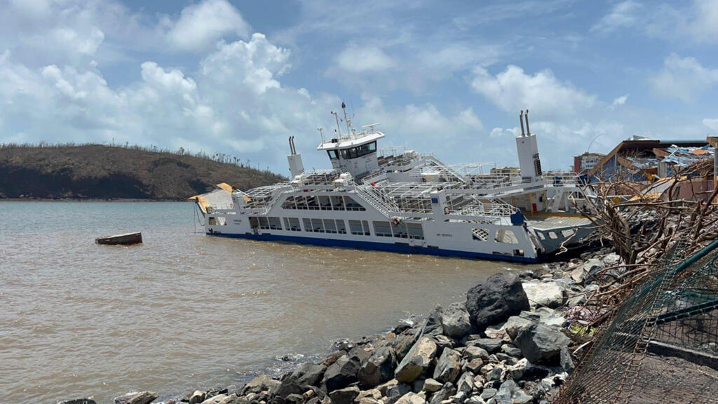 Rescuers race to reach survivors in French territory of Mayotte after cyclone