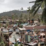 Aid rushed to cyclone-hit Mayotte, rescuers combing debris for survivors