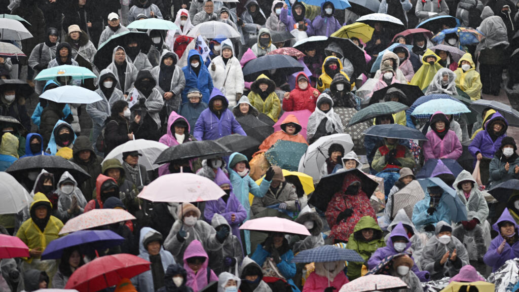 South Korean protesters face off in snowstorm over fate of impeached president