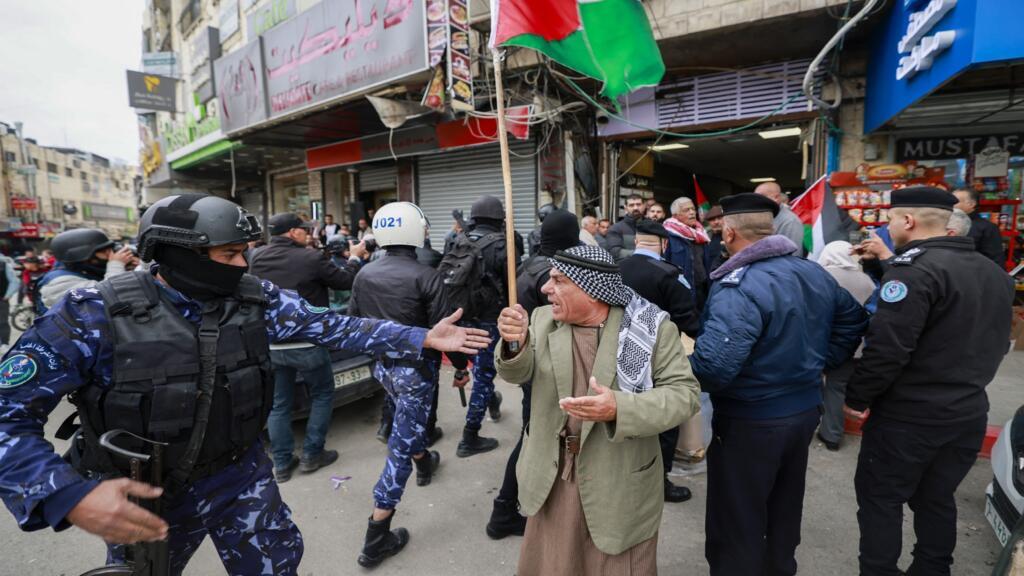 In the West Bank, Palestinian Authority clashes with militant groups and suspends Al Jazeera